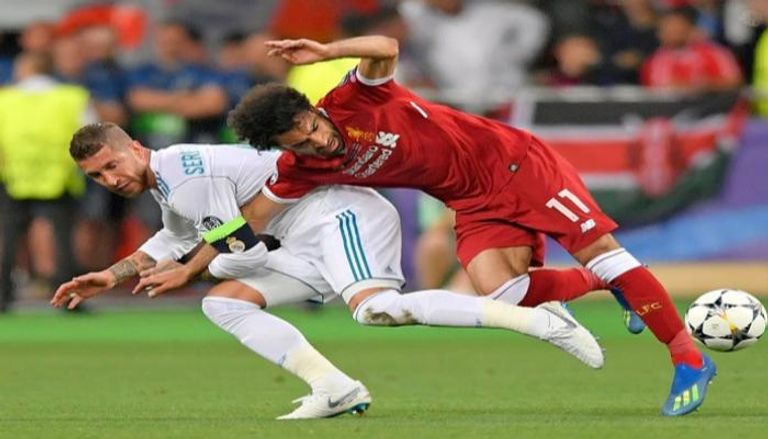 محمد صلاح وسيرخيو راموس هارفي إليوت لاعب ليفربول