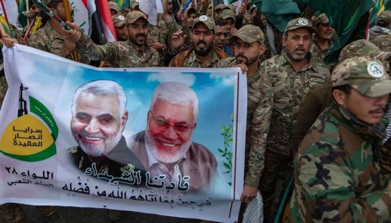 مسيرة لعناصر مليشيات عراقية في بغداد