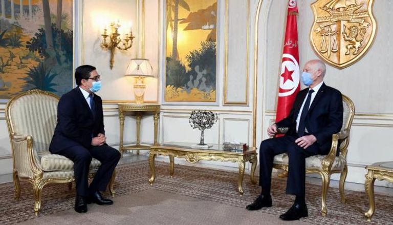 الرئيس التونسي ووزير الخارجية المغربي 