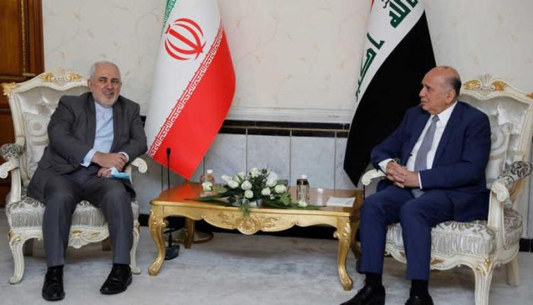 وزير الخارجية الإيراني جواد ظريف يلتقي نظيره الإيراني فؤاد حسين