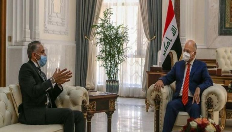 الرئيس العراقي لدى لقائه السفير المصري ببغداد- واع
