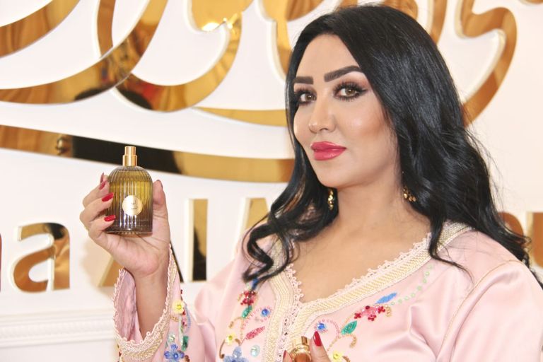 من تصاميم مجموعة العيد للمصممة منى المنصوري