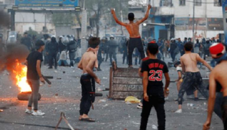 جانب من الاشتباكات التي شهدتها ساحة التحرير العراقية
