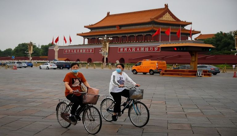 أشخاص يرتدون كمامات للوقاية من عدوى كورونا في بلجيكا