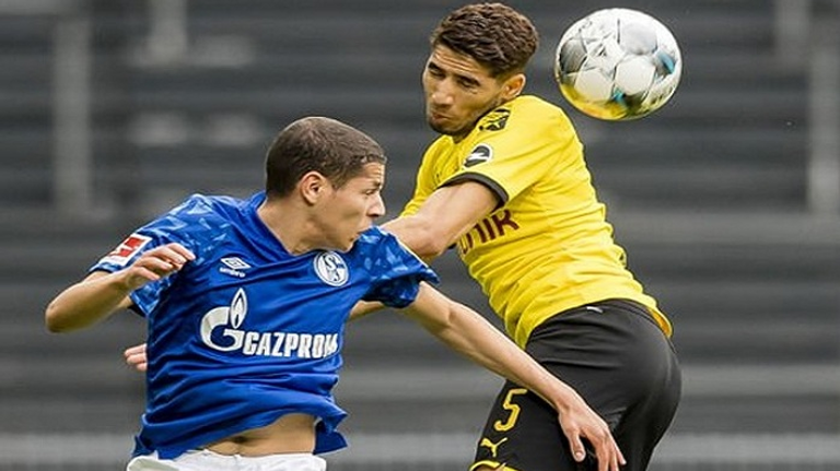 أشرف حكيمي وأمين حارث