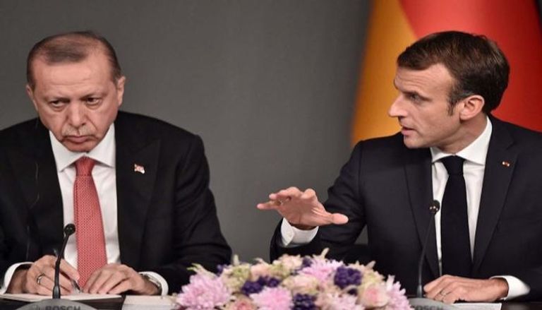 لقاء سابق يجمع الرئيس الفرنسي إيمانويل ماكرون بنظيره التركي رجب طيب أردوغان