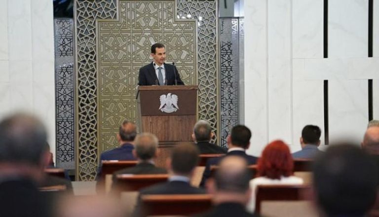 بشار الأسد خلال كلمته أمام البرلمان - رويترز