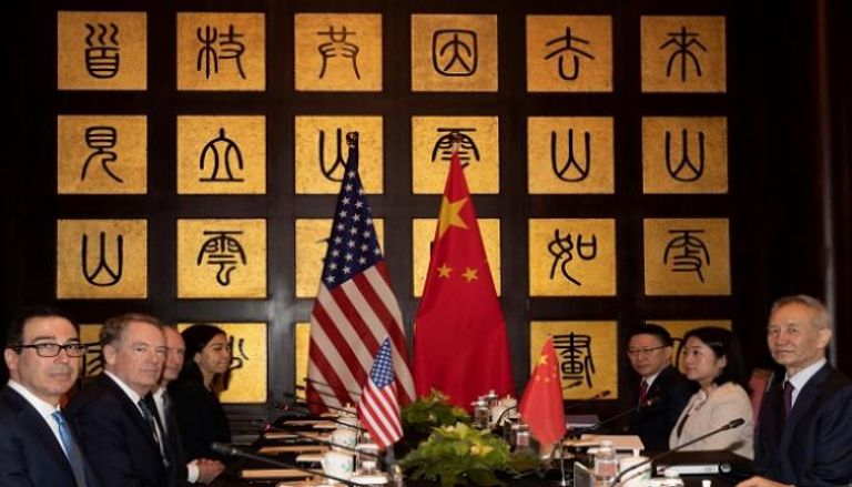 جانب من محادثات سابقة بين واشنطن وبكين في شنغهاي - رويترز