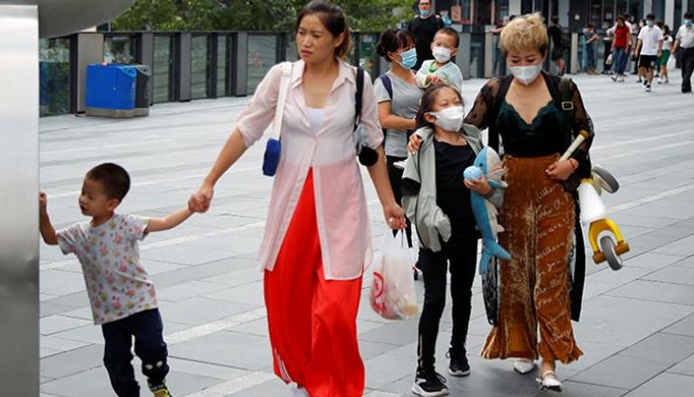 السلطات الصحية في العاصمة الصينية بكين تلغي إلزام السكان بوضع الكمامات