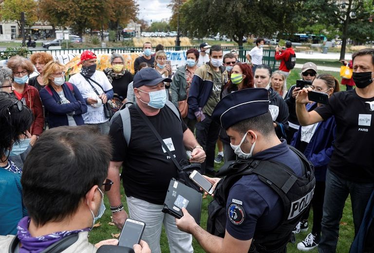 متظاهرون في العاصمة البريطانية ضد إجراءات احتواء فيروس كورونا