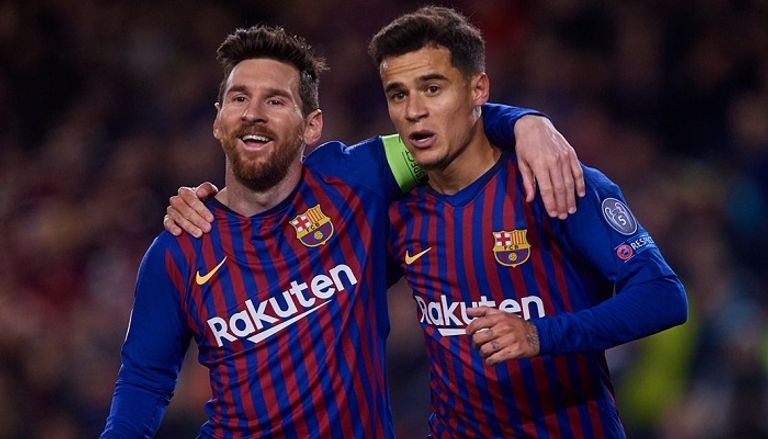 فيليبي كوتينيو وليونيل ميسي لاعبا برشلونة