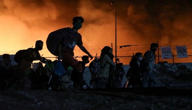 الحريق في مخيم موريا - رويترز