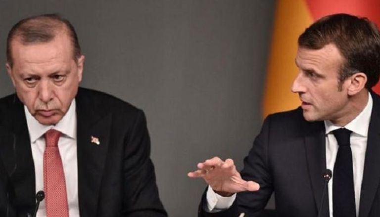 الرئيسان الفرنسي والتركي خلال لقاء سابق