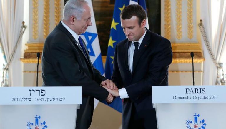 لقاء سابق بين الرئيس الفرنسي إيمانويل ماكرون ورئيس الوزراء الإسرائيلي بنيامين نتنياهو