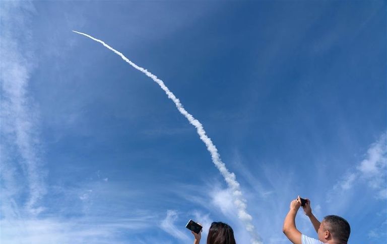 الصين ترسل تسعة أقمار صناعية