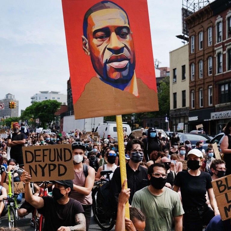 متجر مشتعل خلال أعمال الشغب في مينيابوليس- أرشيفية