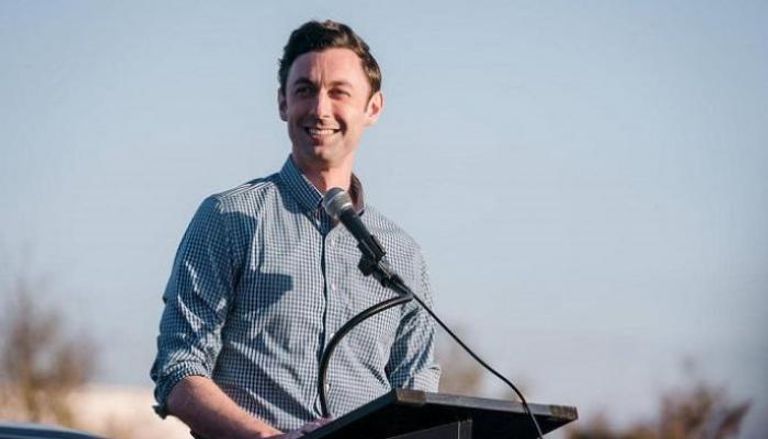 الديمقراطي جون أوسوف الرئيس الأمريكي دونالد ترامب ونائبه مايك بنس- أ ف ب