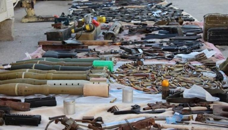 أسلحة نارية للبيع في سوق شعبية ببغداد