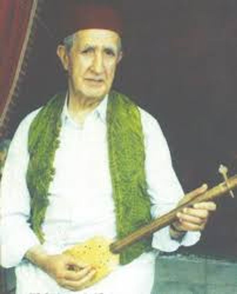 الفنان الجزائري الراحل محمد رشيدي المعروف باسم "الشيخ الناموس" - أرشيفية الفنان الجزائري الراحل محمد رشيدي المعروف باسم "الشيخ الناموس" - أرشيفية
