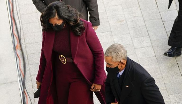 الرئيس الأمريكي الأسبق باراك أوباما وزوجته - أ.ف.ب