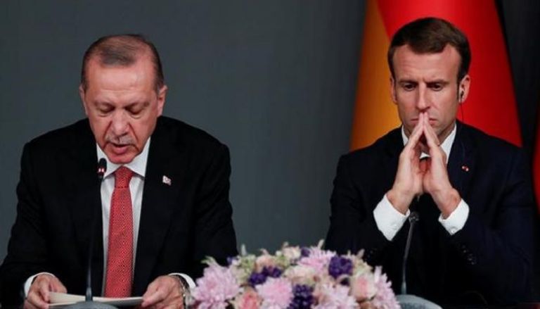 الرئيسان التركي والفرنسي خلال لقاء سابق