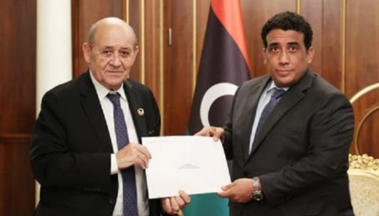 رئيس المجلس الرئاسي الليبي خلال استقباله وزير الخارجية الفرنسي