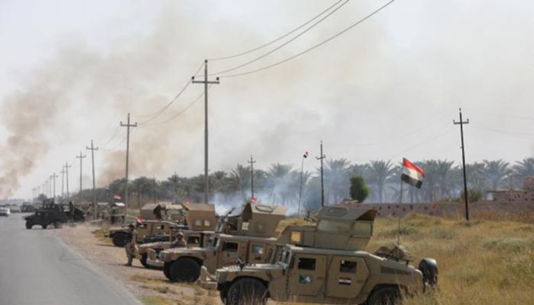 مركبات عسكرية عراقية بالطرق في أعقاب هجمات داعش