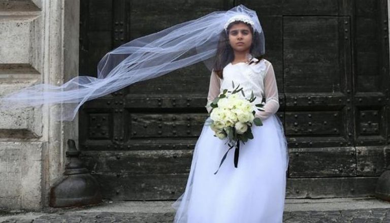 طفلة قاصر بثوب زفاف - صورة تعبيرية