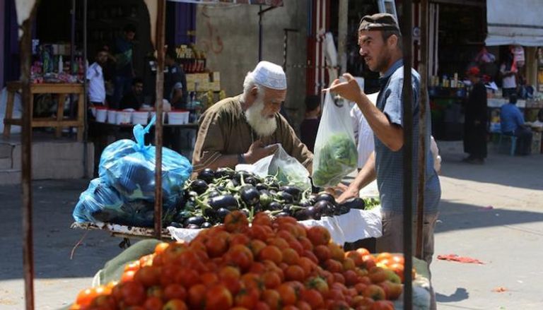 بائع خضروات في أحد شوارع فلسطين