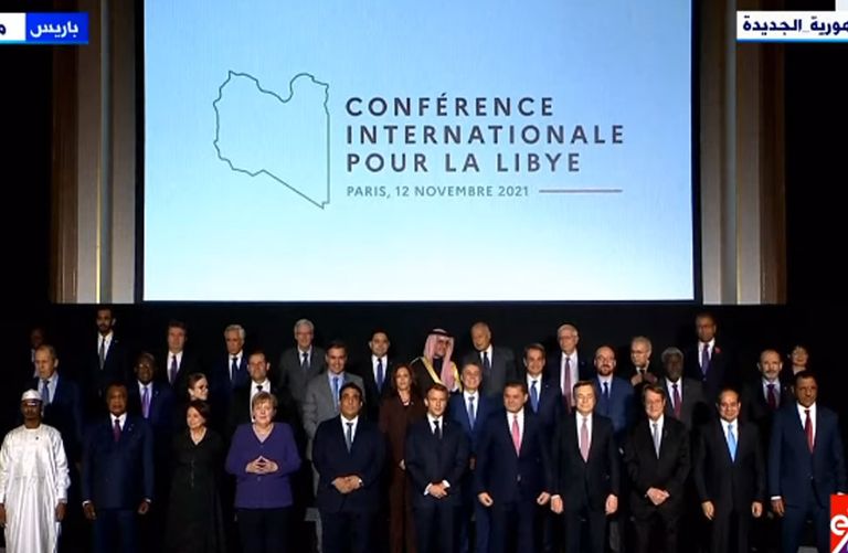 مؤتمر باريس ماكرون والمنفي خلال المؤتمر الصحفي عقب ختام مؤتمر باريس