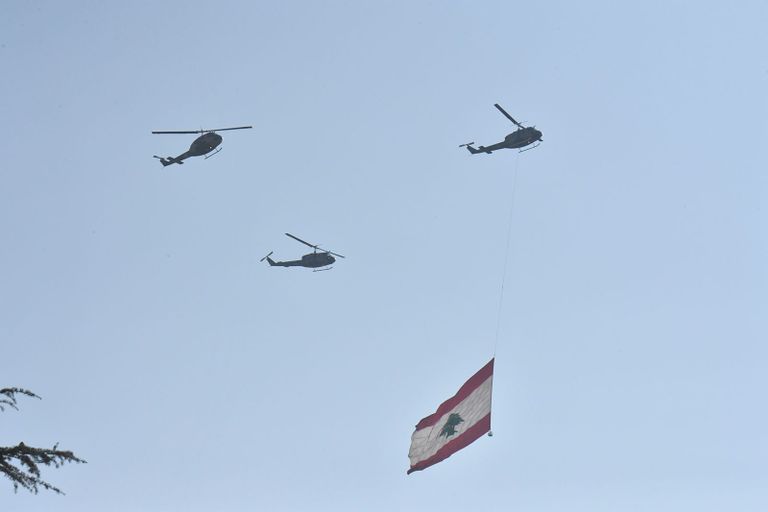 عون وميقاتي وبري خلال عرض الاستقلال في بيروت