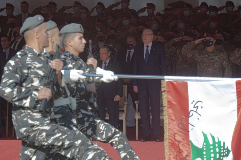 عون وميقاتي وبري خلال عرض الاستقلال في بيروت