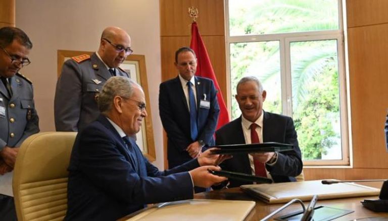 جانب من توقيع الاتفاقية العسكرية بين المغرب وإسرائيل