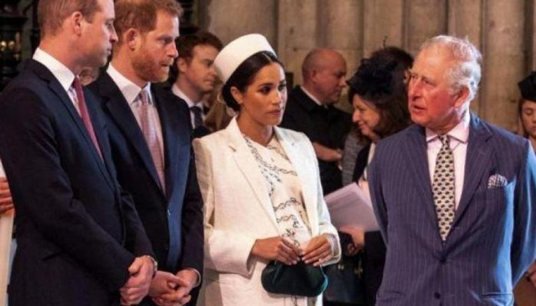 الأمير تشارلز مع الأميرين ويليام وهاري وميجان ماركل 