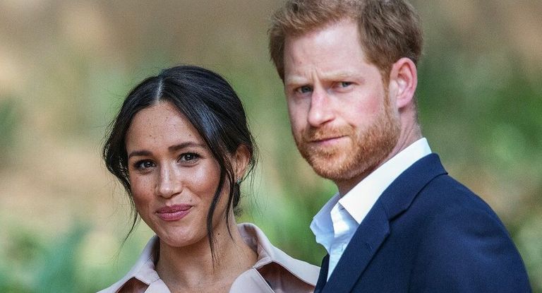 الأمير تشارلز مع الأميرين ويليام وهاري وميجان ماركل 