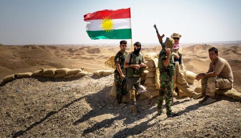 عناصر من قوات البيشمركة الكردية عند مناطق عراقية مشتركة