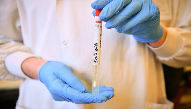 شخص يخضع لاختبار كورونا في الصين- أرشيفية