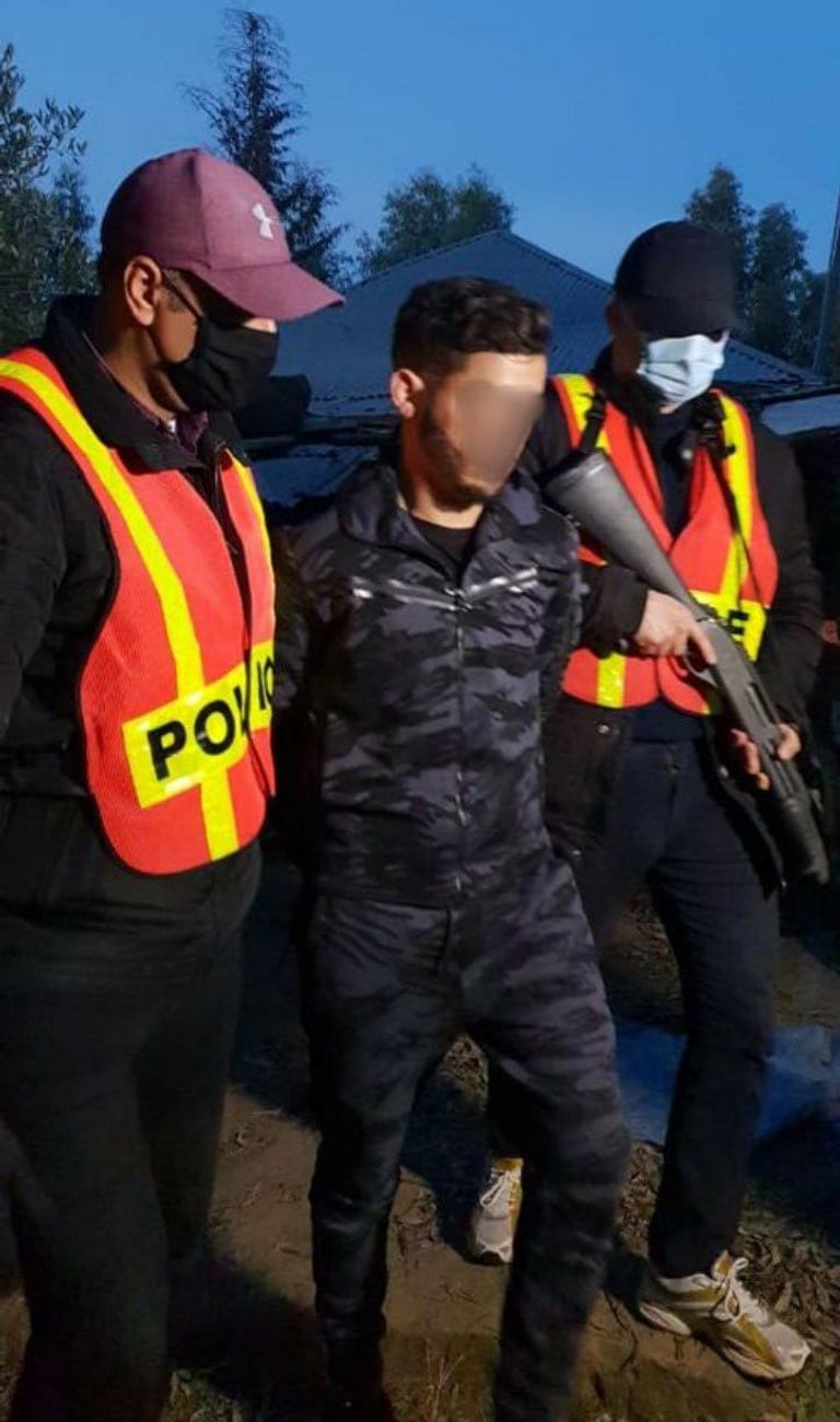 لحظة القبض على أحد المتهمين