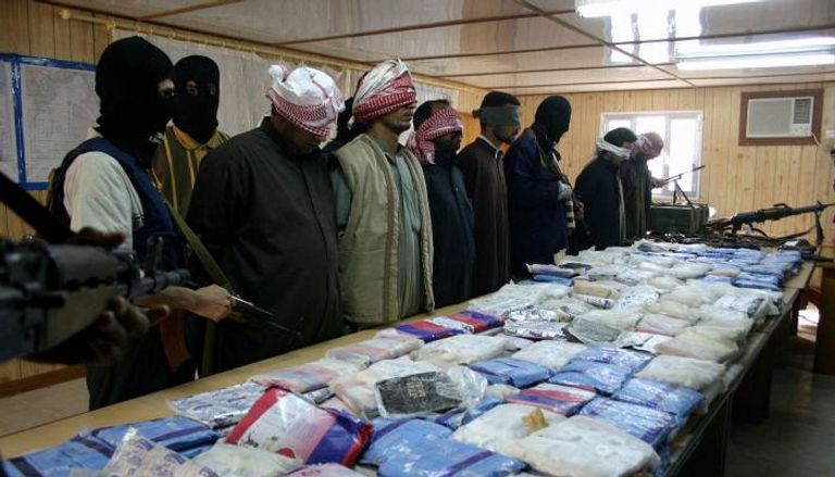 تجار مخدرات في قبضة القوات الأمنية العراقية