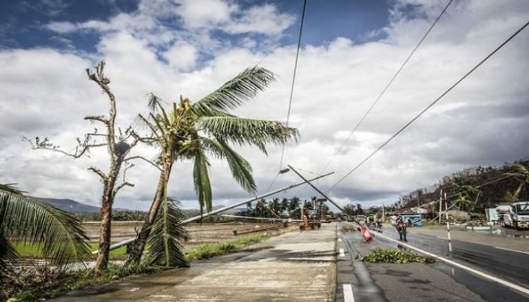 جانب من الدمار الذي خلفه الإعصار راي في الفلبين