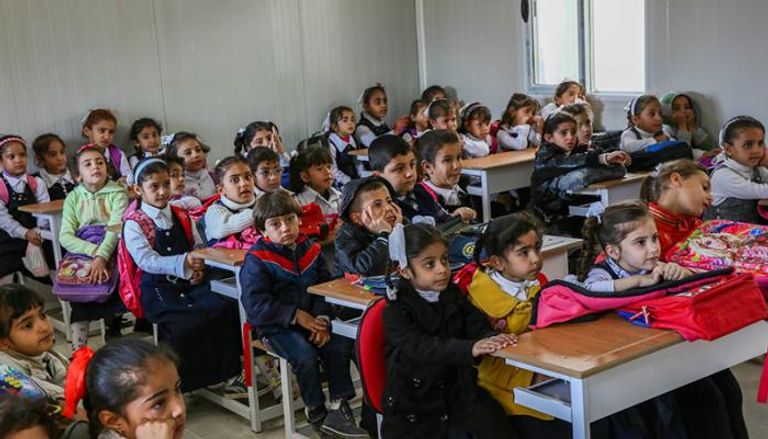 تلاميذ في المرحلة الابتدائية بإحدى مدارس العراق