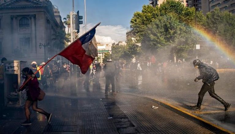 جانب من الاحتجاجات التي شهدتها مدن في تشيلي- أ.ف.ب