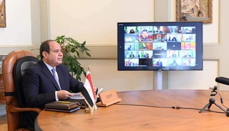 الرئيس المصري خلال مشتاركته البقمة الأفريقية عبر الفيدوكونفرانس