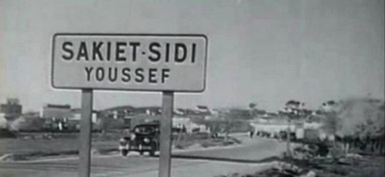ساقية سيدي يوسف خلال فترة الاحتلال الفرنسي لافتة بمناسبة ذكرى مجزرة ساقية سيدي يوسف - أرشيفية