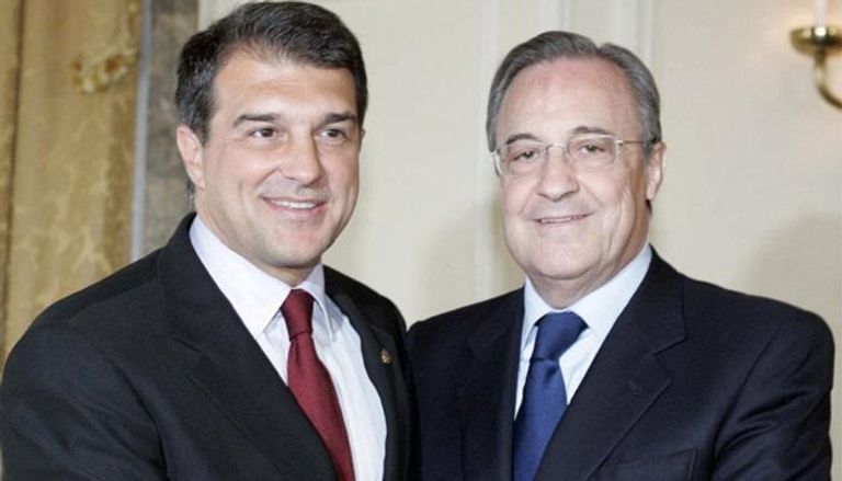 خوان لابورتا رئيس برشلونة وفلورنتينو بيريز رئيس ريال مدريد
