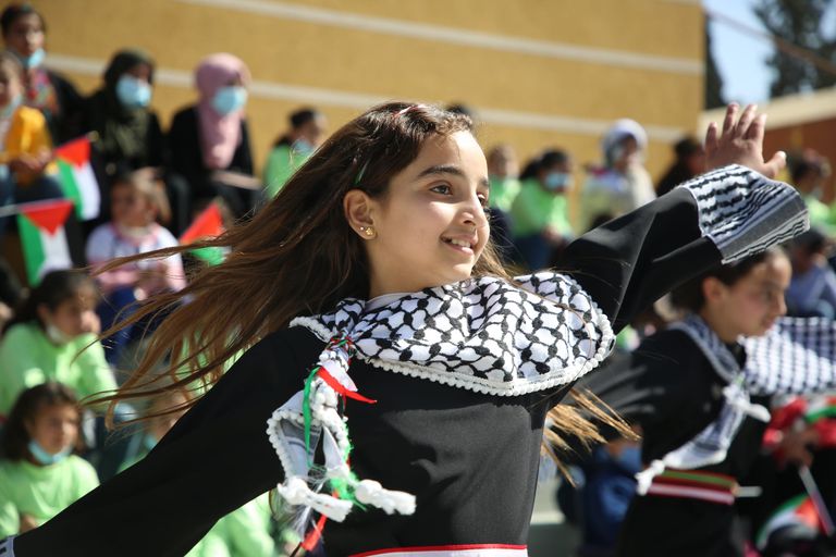 جانب من فعاليات المهرجان الثقافي السنوي بعنوان "فلسطين موطني"