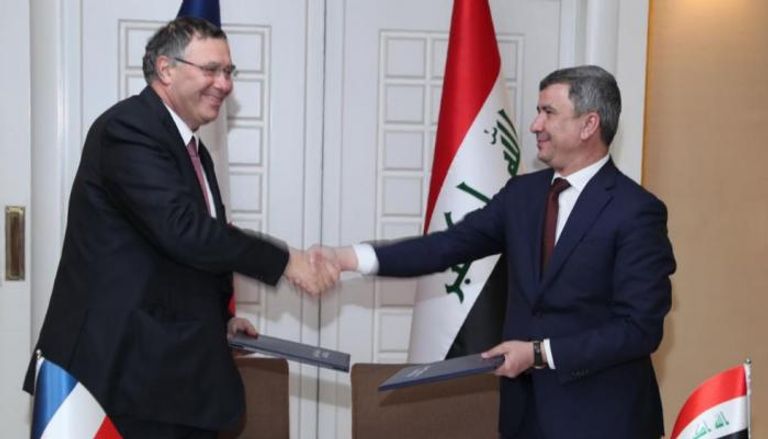 وزير النفط العراقي ورئيس توتال
