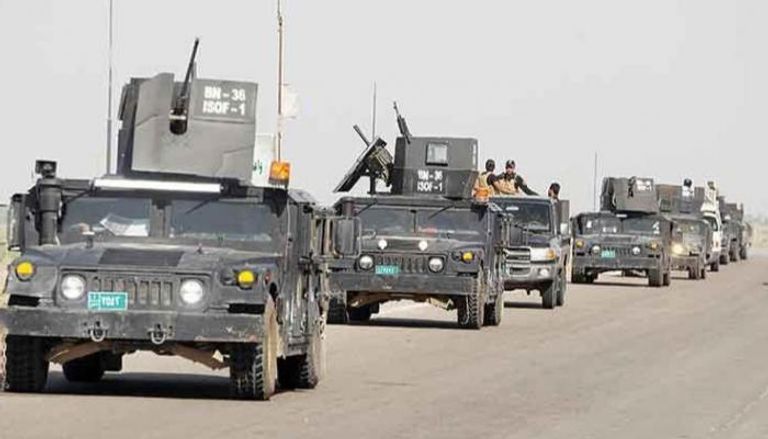 قوة أمنية خلال عمليات ملاحقة لداعش في العراق 