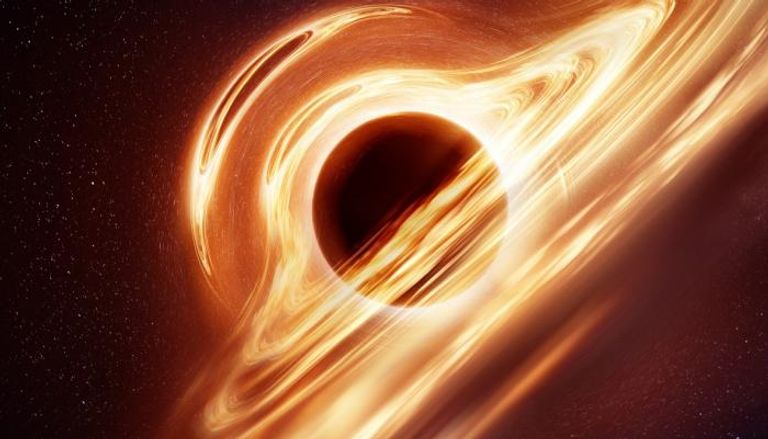 صورة تبين هالة ثقب أسود ضخم في الفضاء