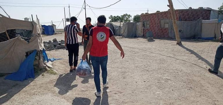 كرفان متحرك لتوزيع الفطور المجاني على الصائمين في الفلوجة